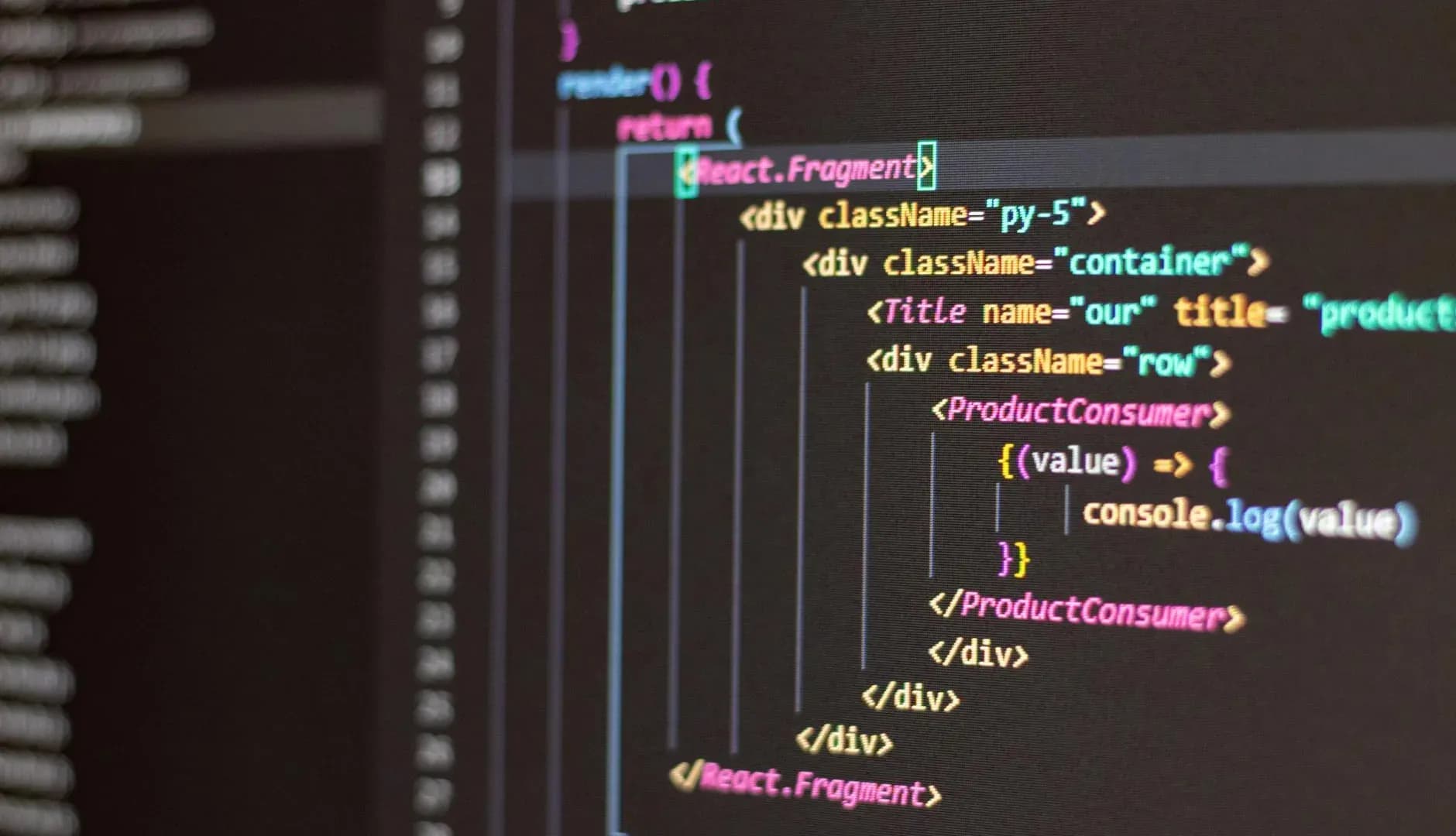 Close-up of HTML and JavaScript code displayed on a computer screen in Visual Studio Code editor.